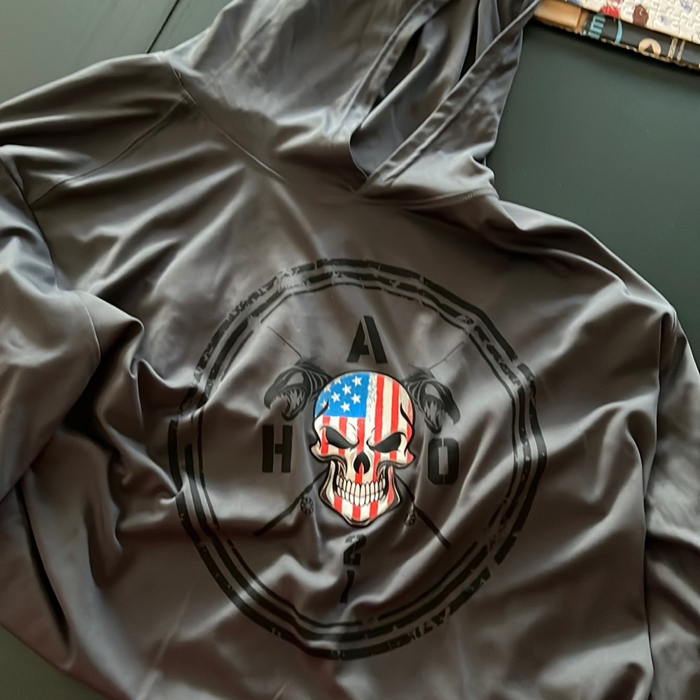 Men’s performance wear  hooded and long sleeved  Rash guard type fabric